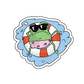 Sticker of a relaxed frog on holiday, perched on an inflatable wheel in a pool, wearing sunglasses and heart-adorned swimming shorts, exuding chill and relaxation.